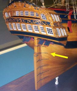 A similar ship shows the position of the rudder gudgeon (arrowed)