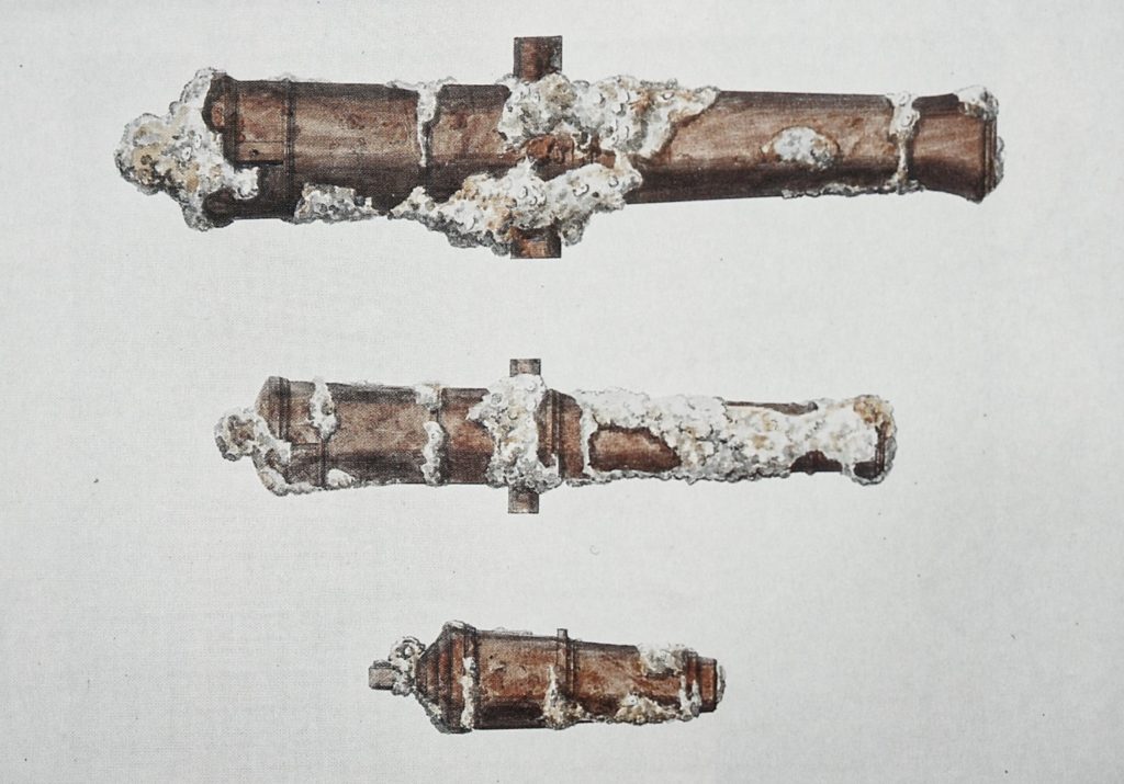 Deane’s drawing of three guns recovered from Colossus. The guns are shown partially encrusted with grey concretion caused by the salt water of the sea corroding the metal.